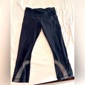 Black, lululemon cropped running pants. Good, used condition